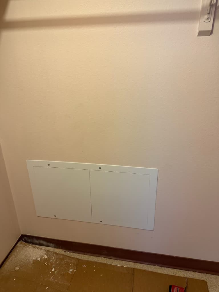 During: plumbing access panel being installed in interior wall — Oopsie Daisy Plumbing Northern Colorado bathroom plumbing